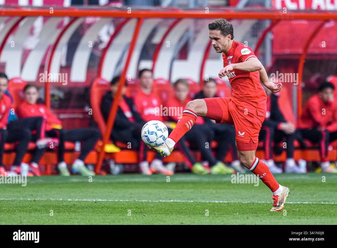 Van Rooij ENSCHEDE, NETHERLANDS - MARCH 9: Bart van Rooij of FC Twente controls ...