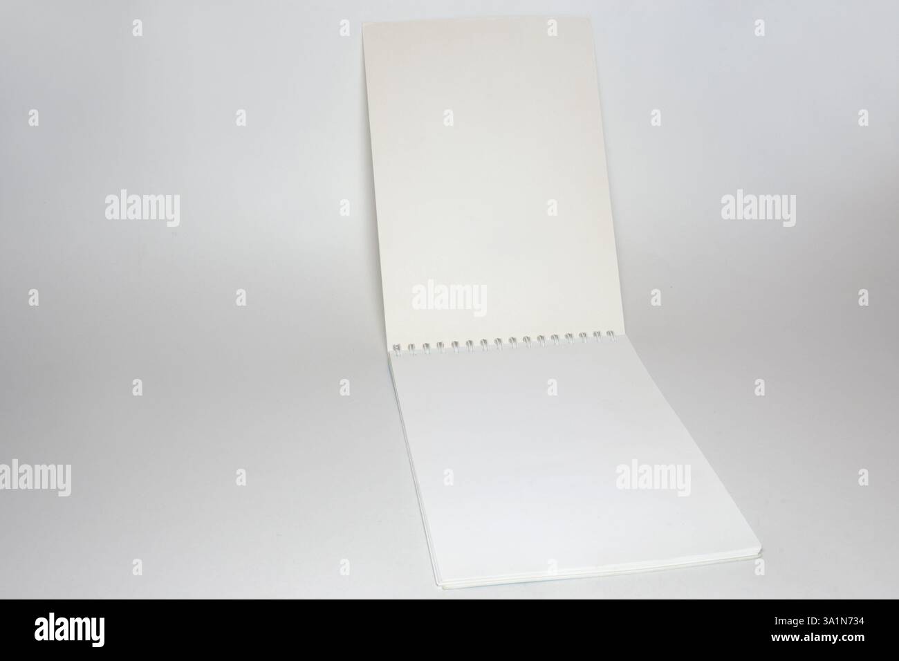 blank flip notepad on a binding spring Stock Photo