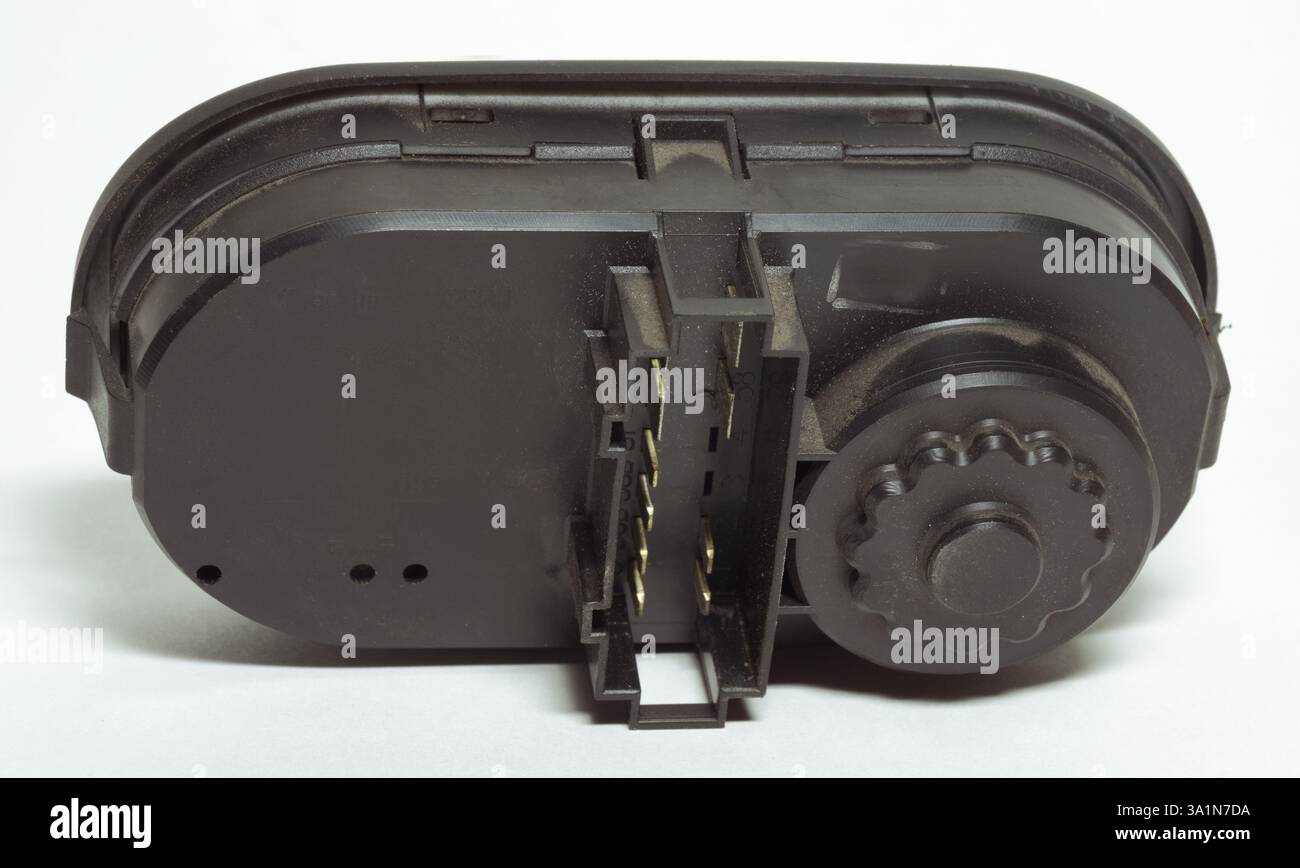 headlight position control module back side with connecting block pad Stock Photo