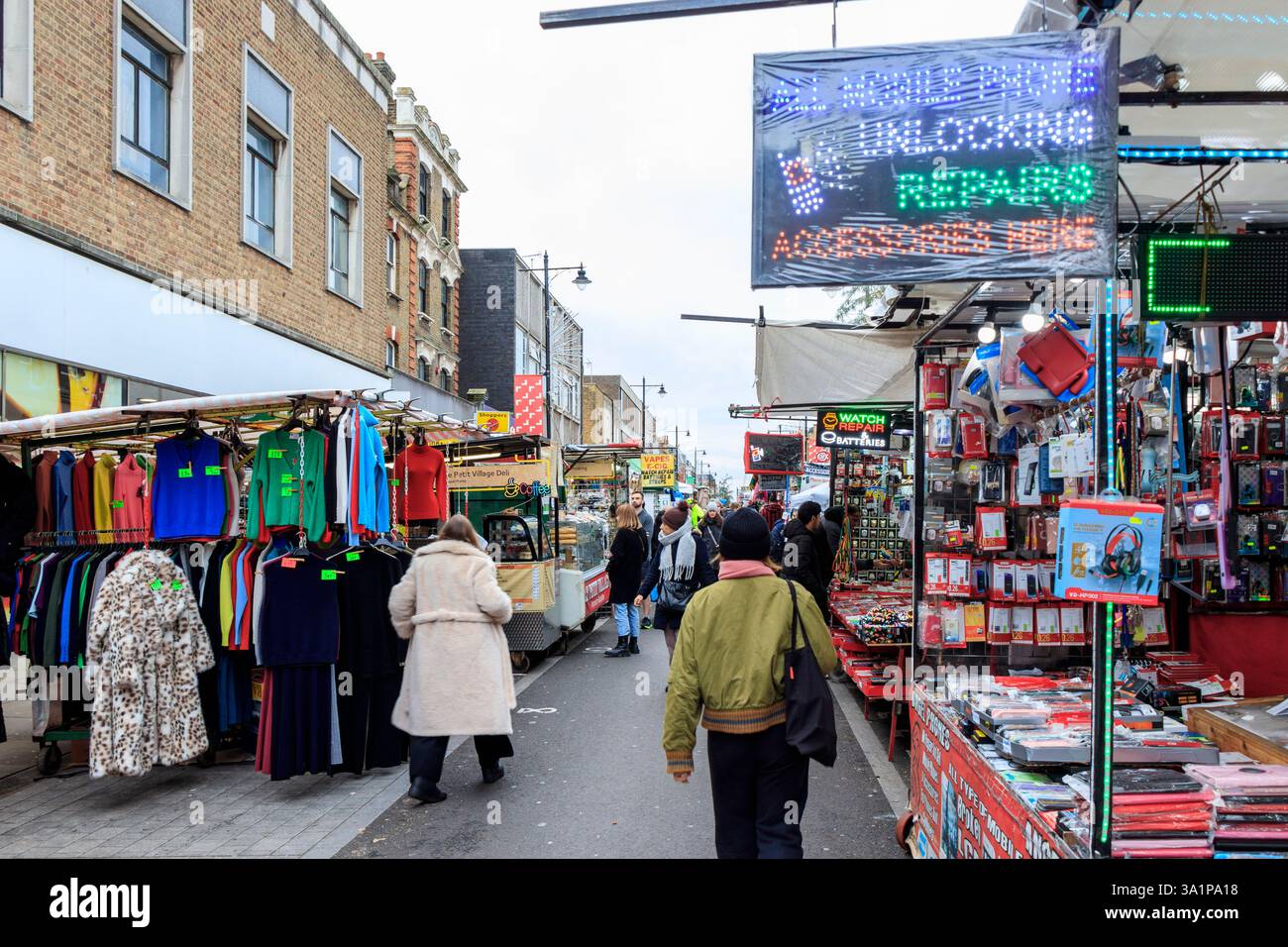 Festive shoppers at Chapel Market at The Angel, Islington, London, UK Stock Photo