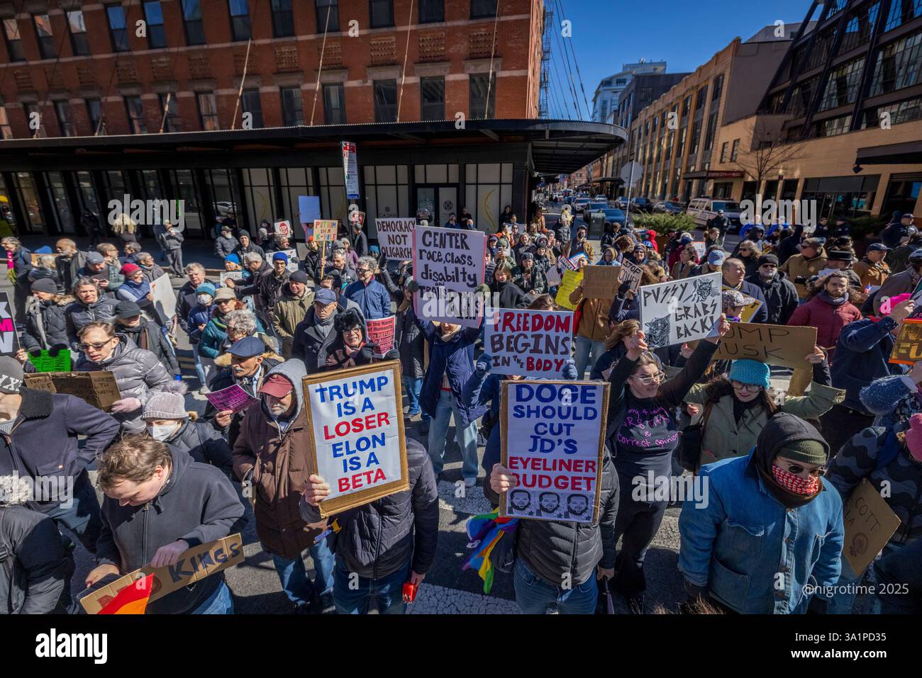 Hundreds protest outside a Tesla showroom. Protests outside Tesla ...