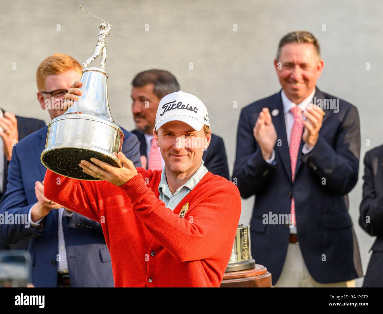 March 9, 2025 Russell Henley hoist the Arnold Palmer Invitational Trophy on 18th green after