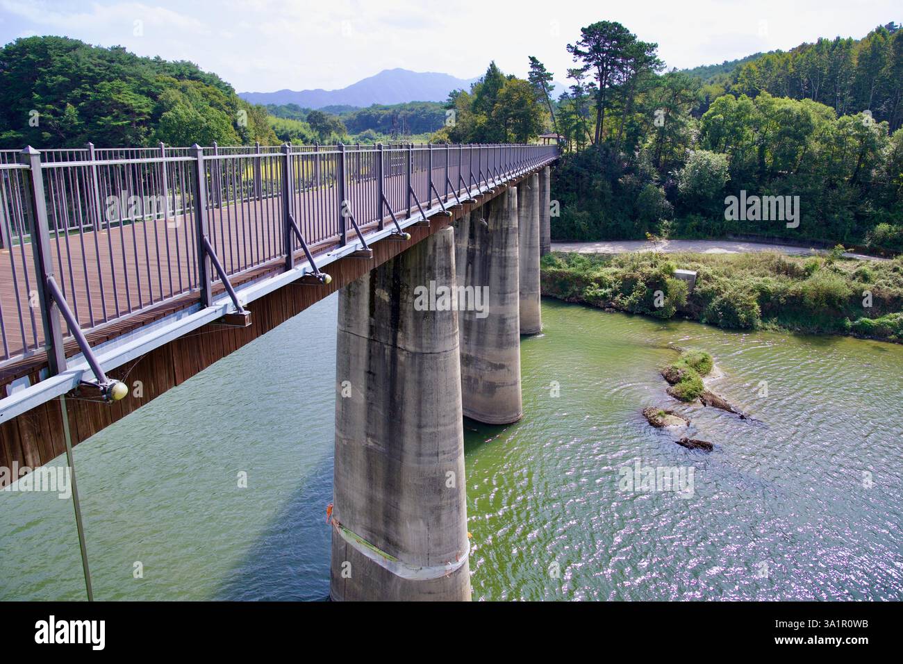 Sunchang County, South Korea - October 3, 2021: A side view of Hyangga Bridge, a repurposed railway structure spanning the Seomjin River, now serving Stock Photo