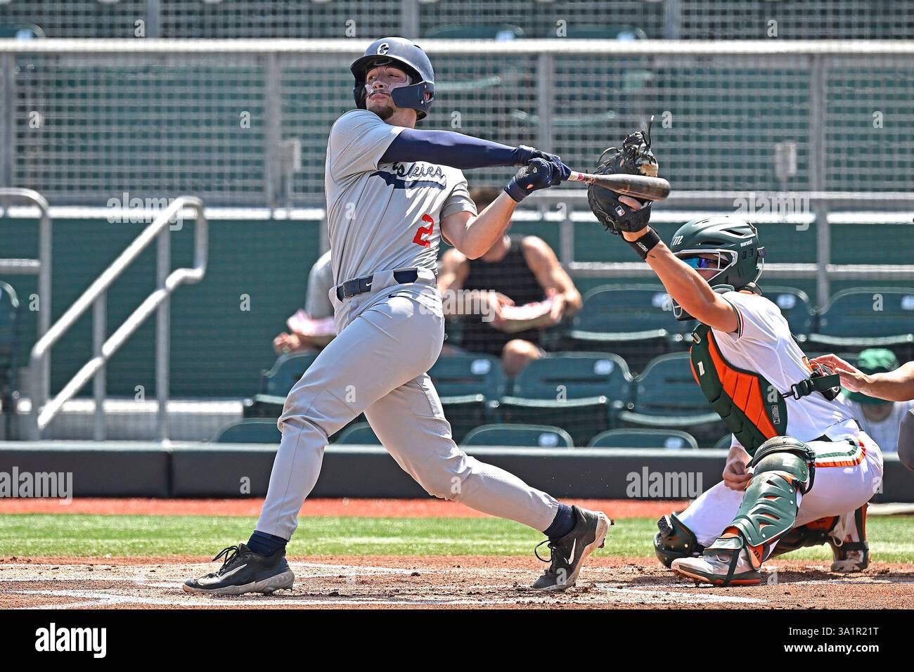 CORAL GABLES, FL - MARCH 09: UConn infielder Tyler Minick (2) bats in ...