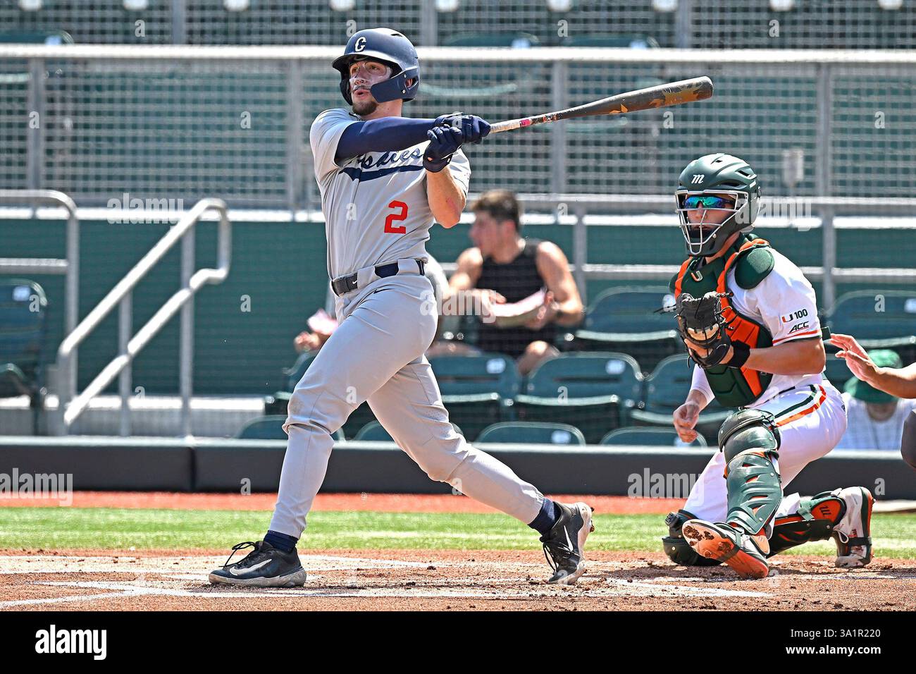 CORAL GABLES, FL - MARCH 09: UConn infielder Tyler Minick (2) bats in ...