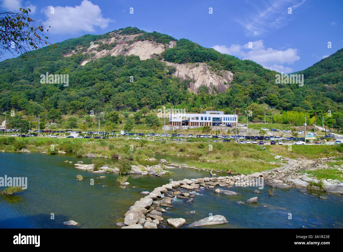 Sunchang County, South Korea - October 4, 2021: A view of Mount Yonggu rising above the Janggunmok Certification Center, where cyclists on the Seomjin Stock Photo