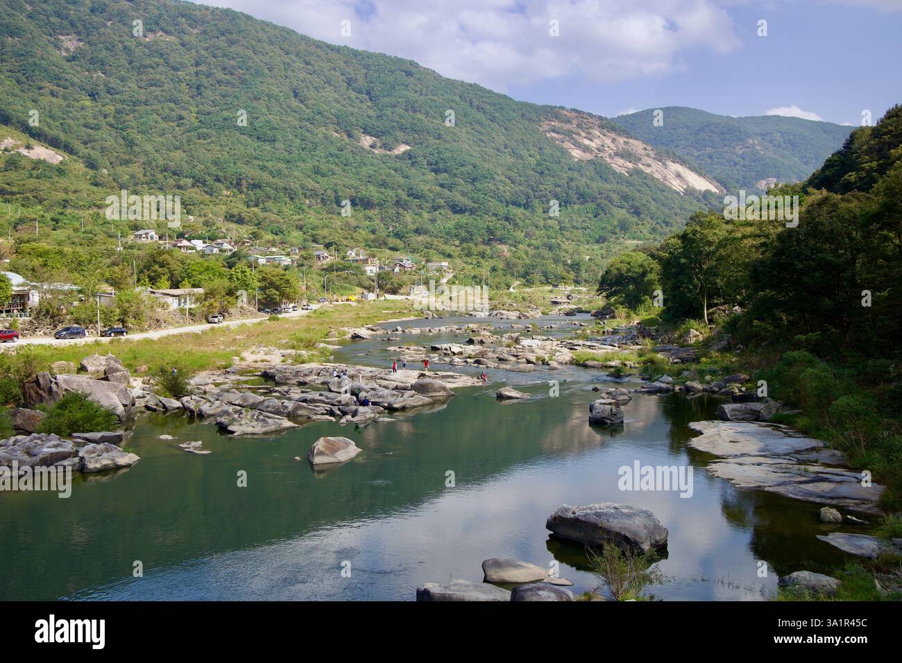Sunchang County, South Korea - October 4, 2021: A scenic view of the Seomjin River meandering through Janggunmok, surrounded by lush mountains, scatte Stock Photo