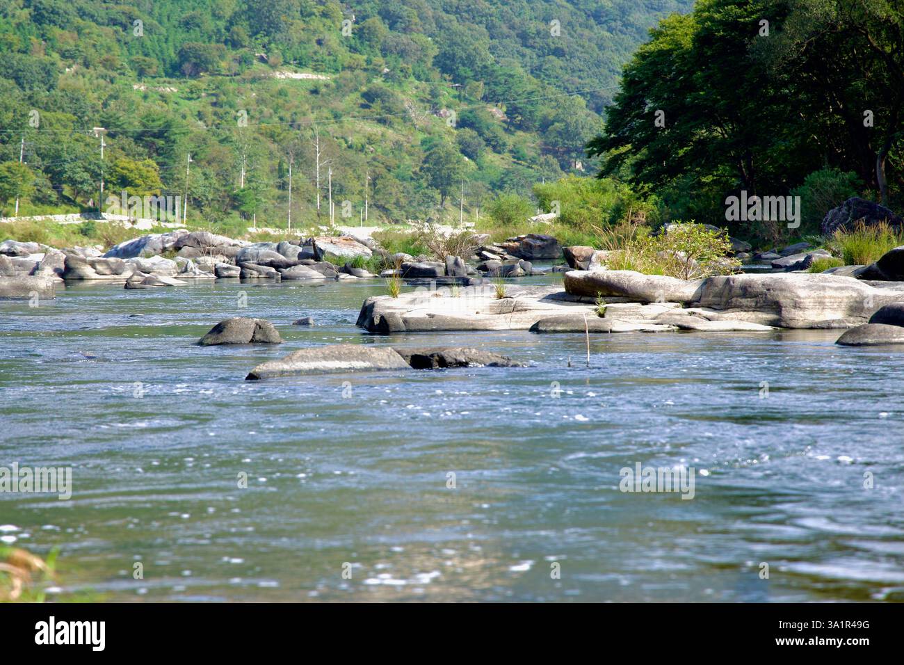 Sunchang County, South Korea - October 4, 2021: The Seomjin River flows through Janggunmok, weaving around smooth rock formations shaped by centuries Stock Photo