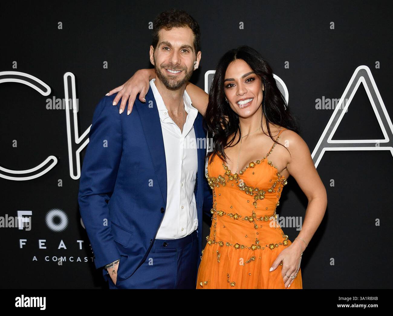 Aaron Mazor, left, and Odelya Halevi attend the premiere of Focus ...