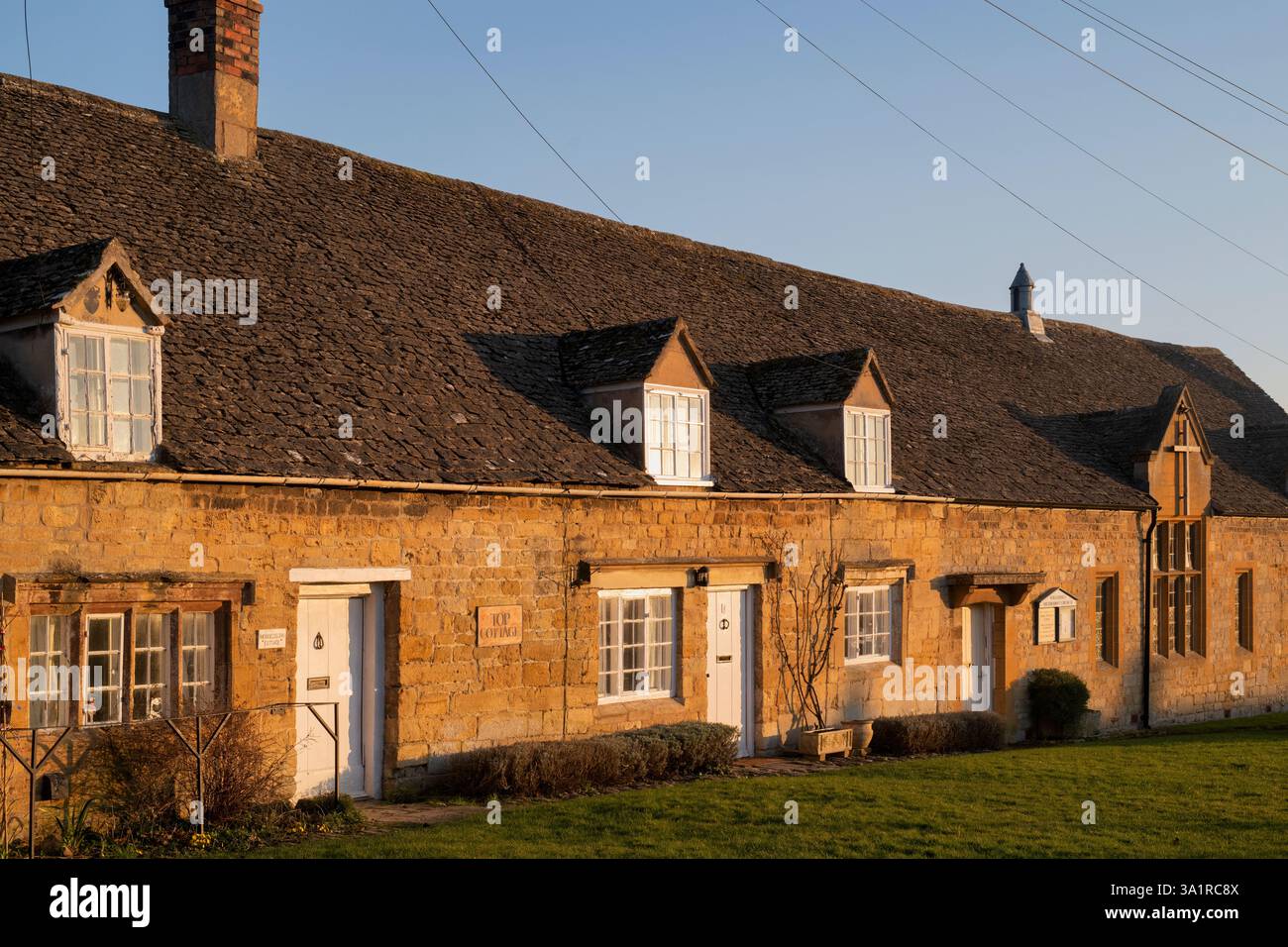 Row cottages road church view hi-res stock photography and images - Alamy