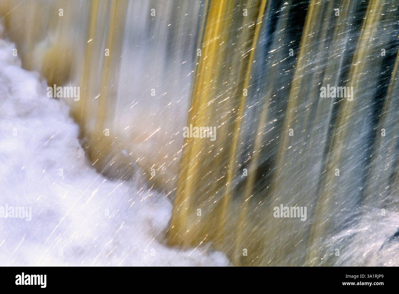 Waterfall with water splashing in a river Stock Photo