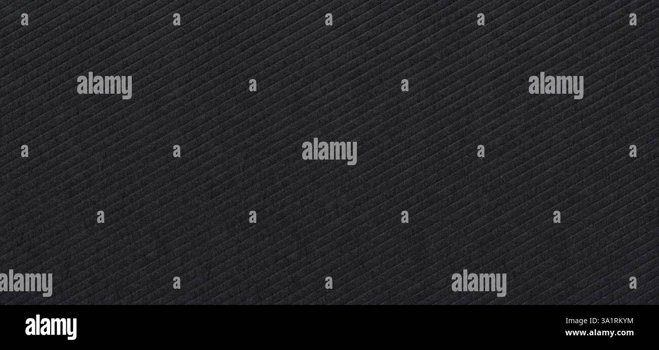 striped embossed black paper cardboard abstract background Stock Photo