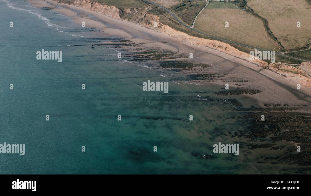 Very low tide at Compton beach on an August summers day Stock Photo Alamy