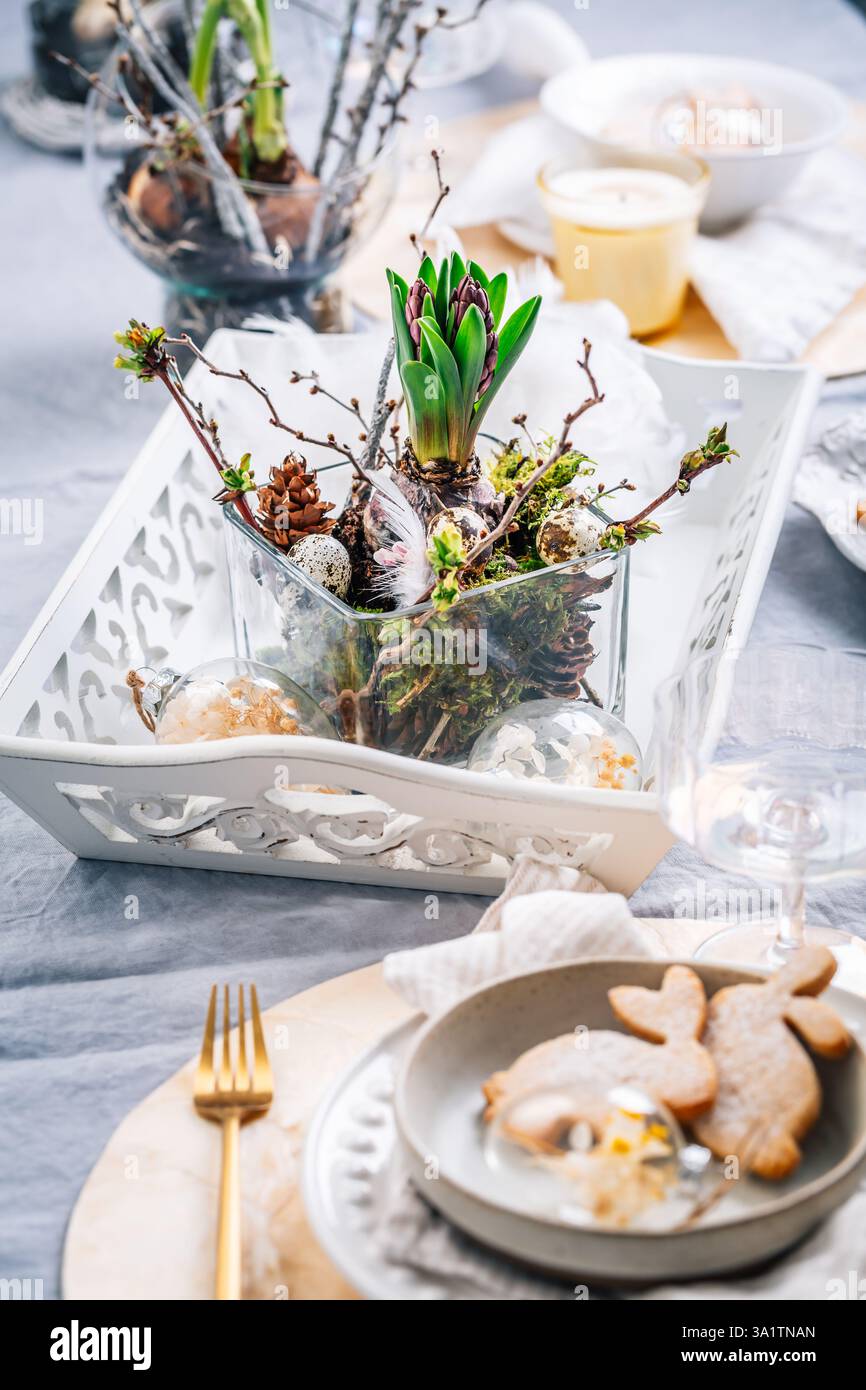 Beautiful table serving for Easter celebration in dining room Stock Photo