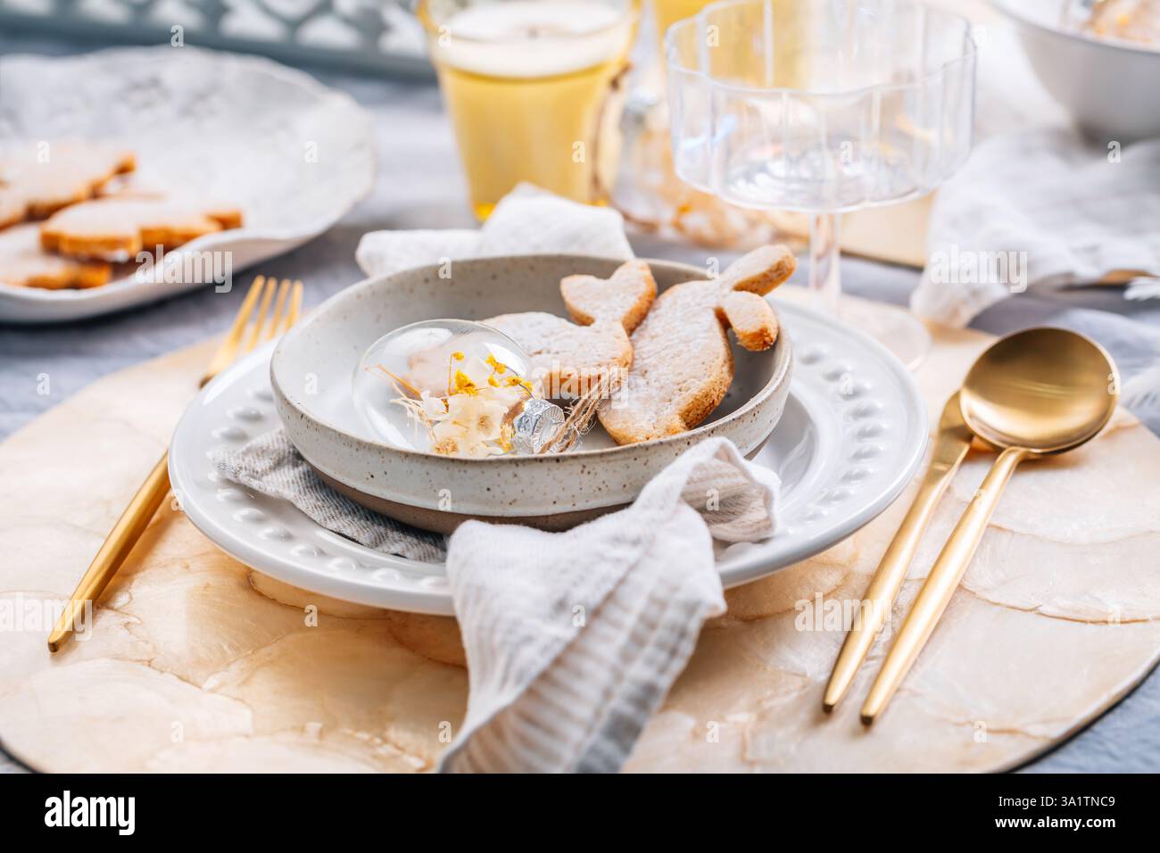 Beautiful table serving for Easter celebration in dining room Stock Photo