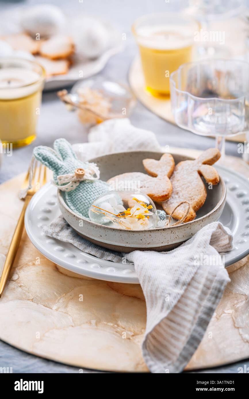 Beautiful table serving for Easter celebration in dining room Stock Photo