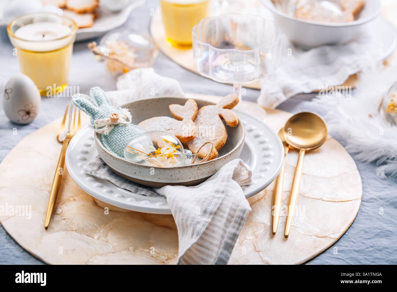 Beautiful table serving for Easter celebration in dining room Stock Photo