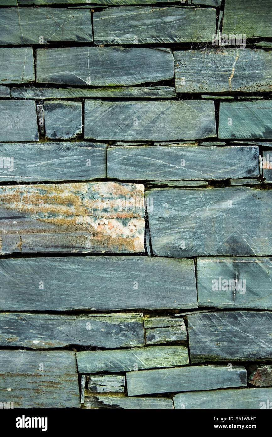 Cut slate brick wall Stock Photo