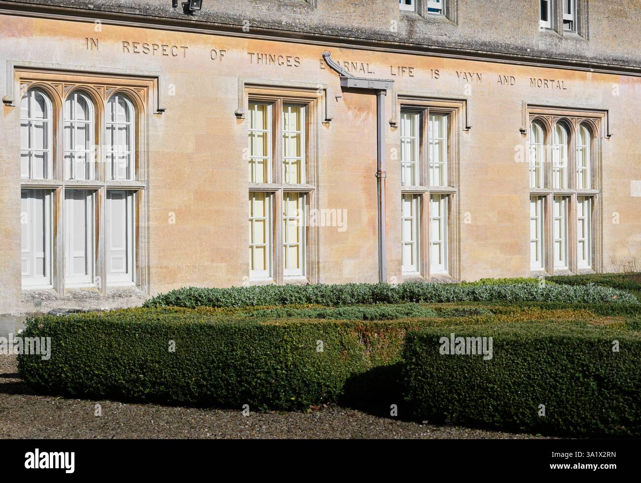 Mortality and eternity emblazoned on Lamport Hall, a grade1 listed building, Northamptonshire, England. Stock Photo