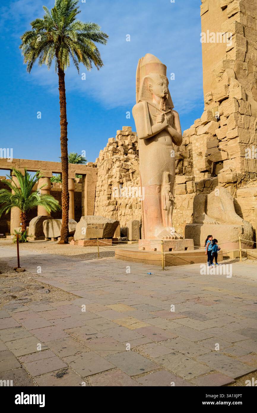 Statue Rameses Ii Colossal Granite statue of Rameses II by the entrance to the Hypostyle ...