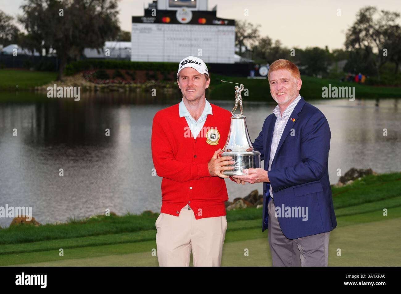 9th March 2025, Orlando, Florida, USA; PGA golfer Russell Henley poses with the trophy after