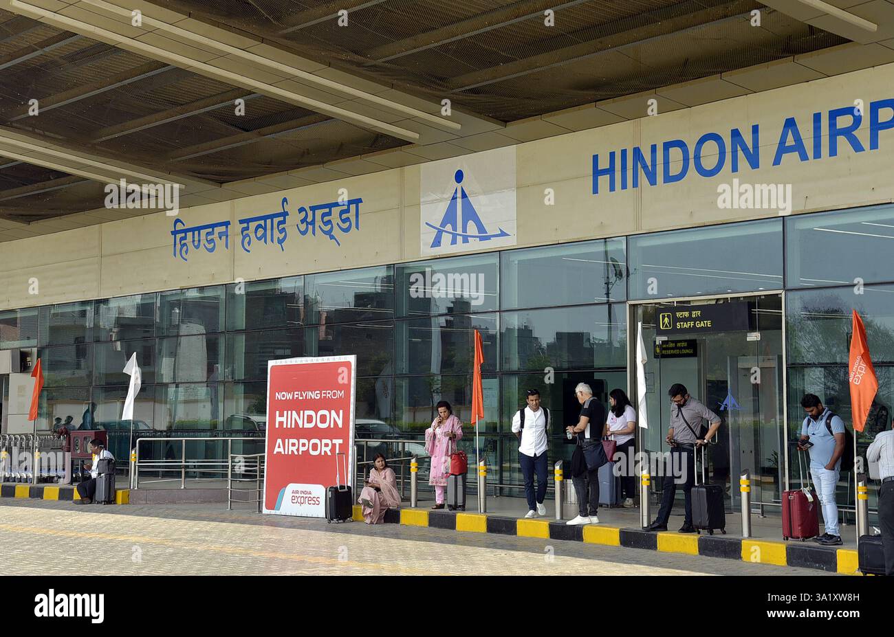 ghaziabad-india-march-10-passengers-carrying-their-luggage-as-first