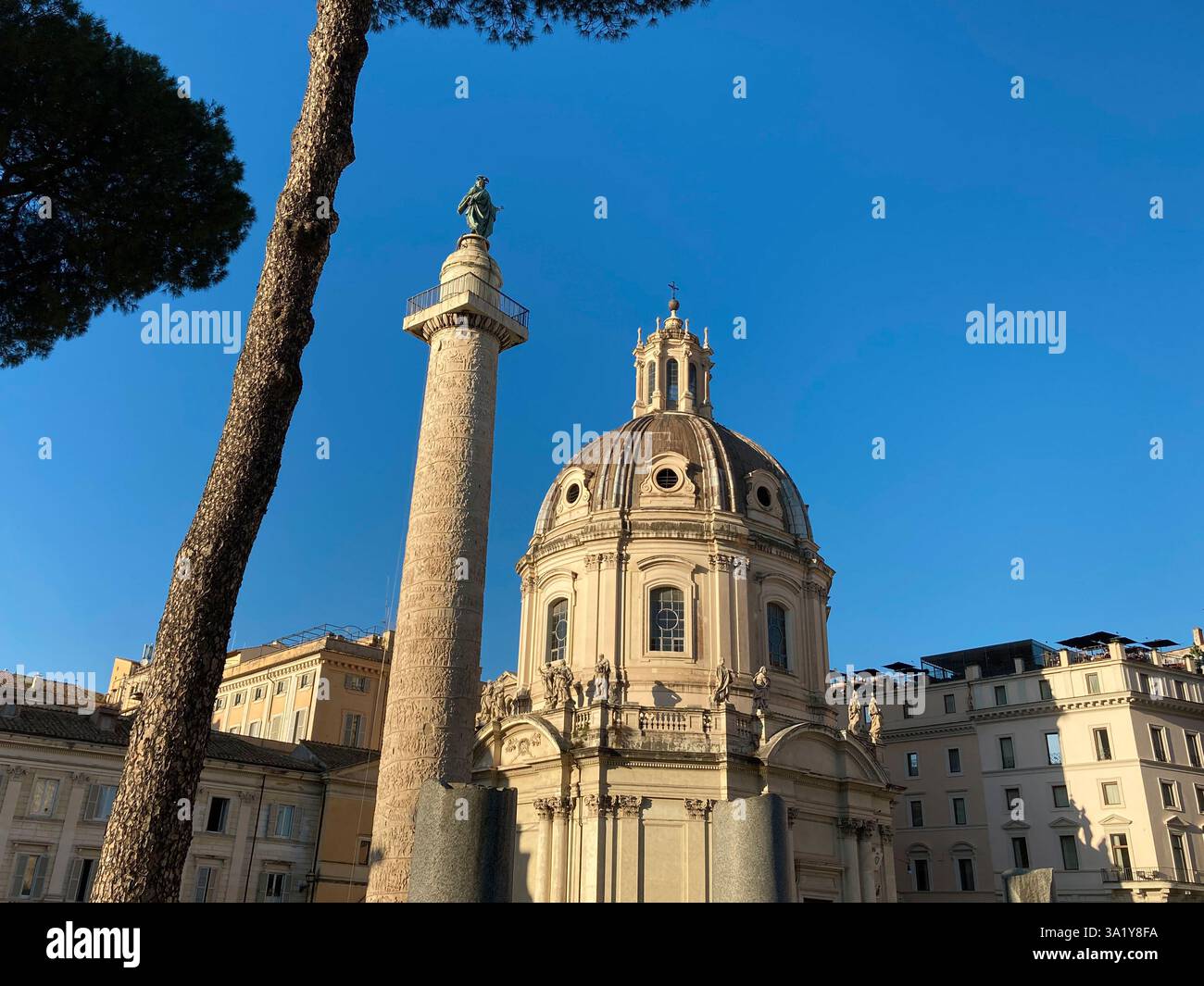 Italy, Lazio, Rome, Trajan's Column Background Santissimo Nome di Maria al Foro Traiano Church - Smartphone Captured Stock Image