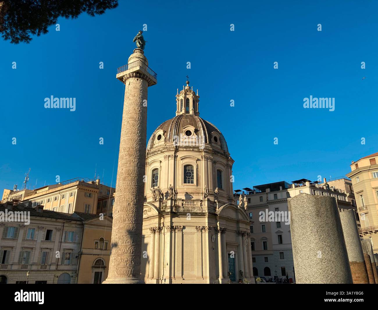 Italy, Lazio, Rome, Trajan's Column Background Santissimo Nome di Maria al Foro Traiano Church - Smartphone Captured Stock Image