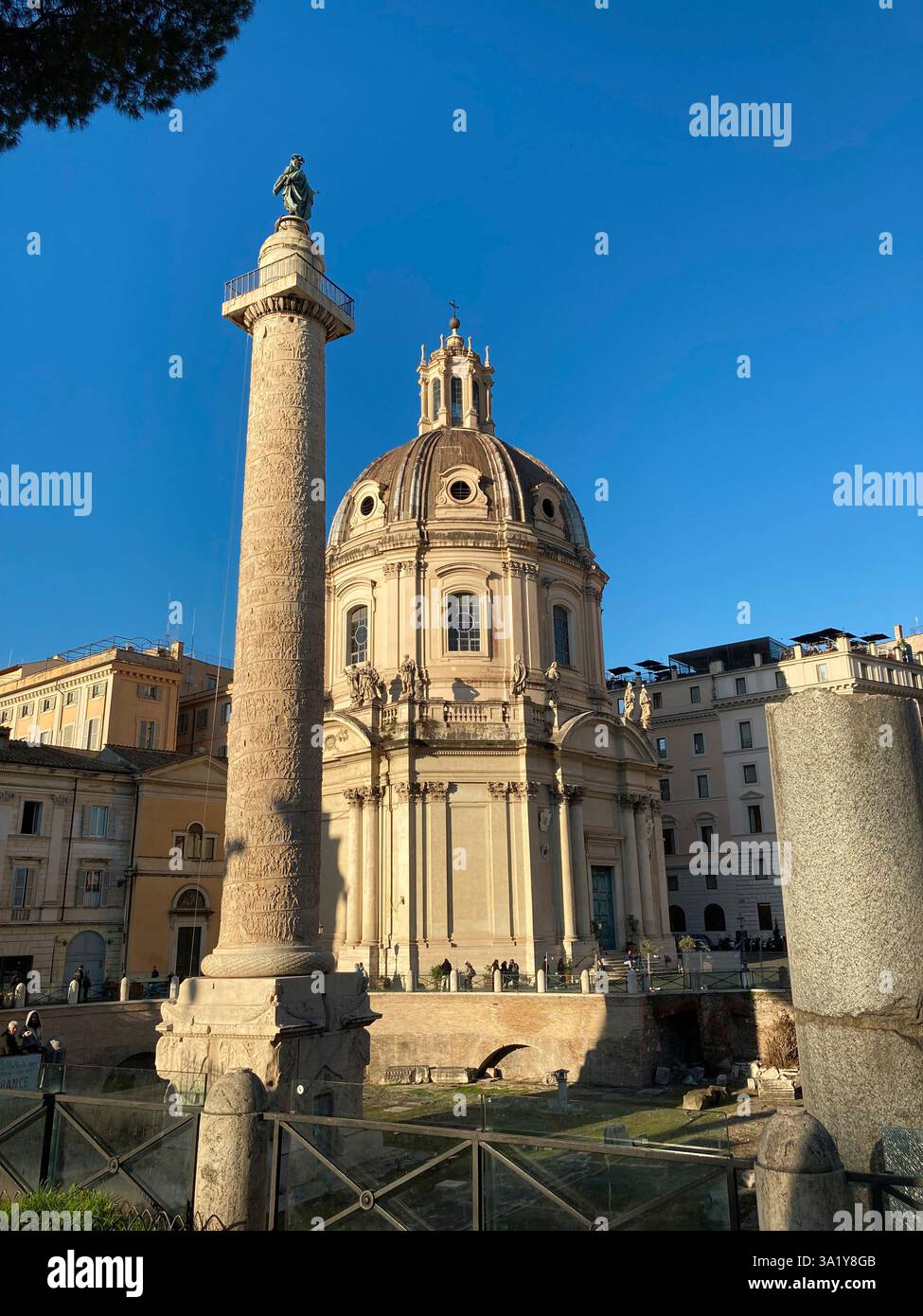 Italy, Lazio, Rome, Trajan's Column Background Santissimo Nome di Maria al Foro Traiano Church - Smartphone Captured Stock Image