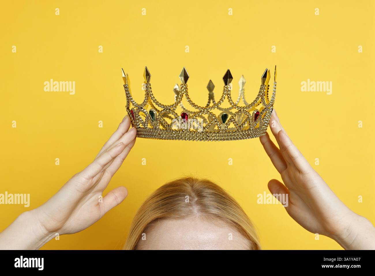 Princess wearing golden crown hi-res stock photography and images - Alamy