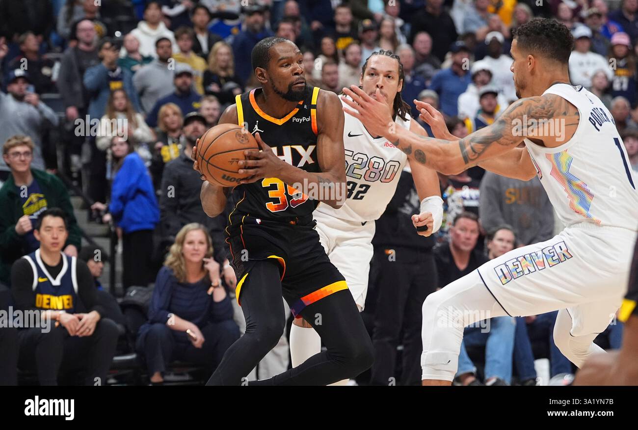 Phoenix Suns forward Kevin Durant (35) and Denver Nuggets forward ...