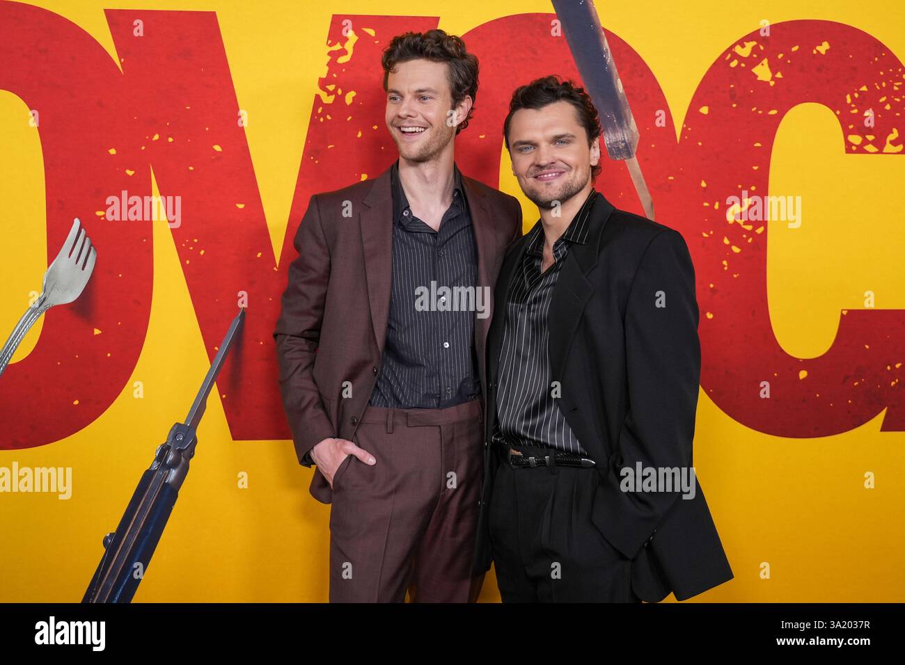 Jack Quaid, left, and Ray Nicholson arrive at the premiere of "Novocaine" on Monday, March 10