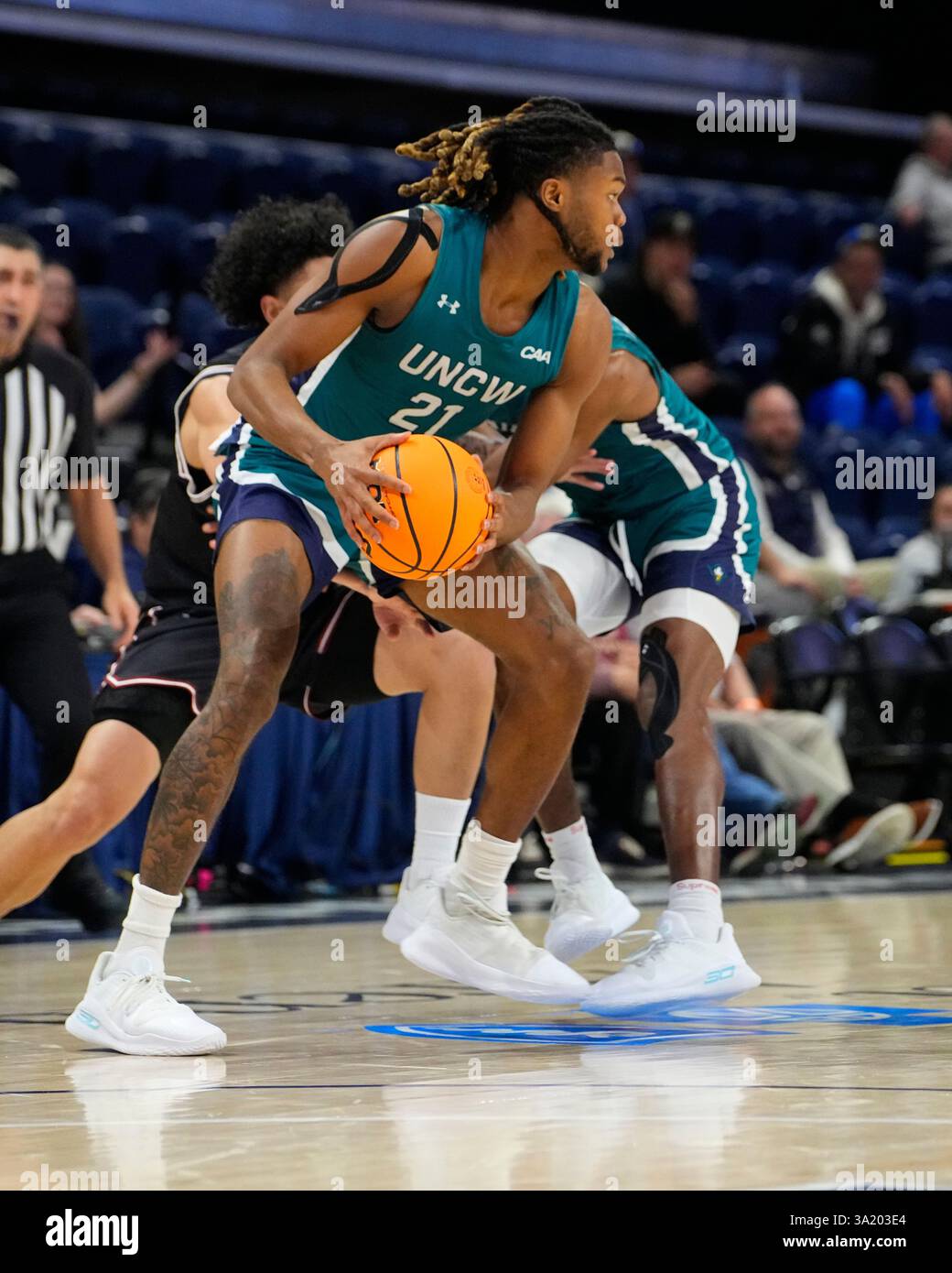WASHINGTON, DC - MARCH 10: UNC Wilmington Seahawks Forward Khamari ...