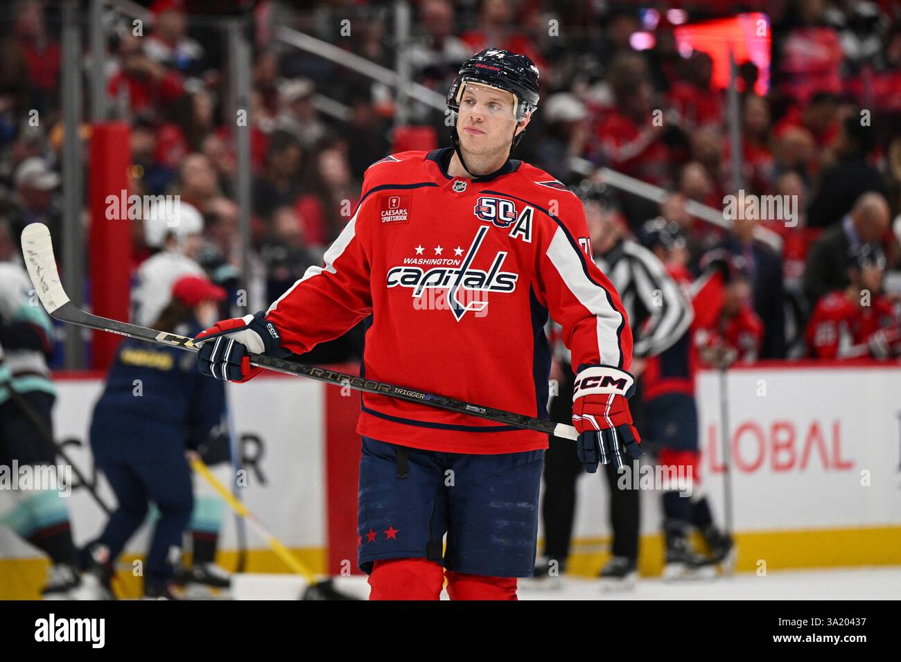 Washington Capitals defenseman John Carlson looks on during an NHL hockey game against the