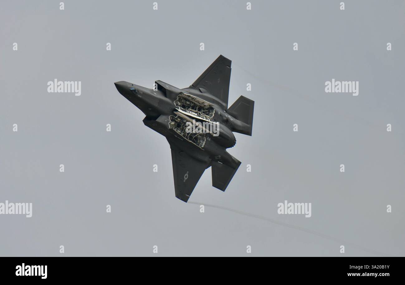 The US Air Force F-35 Demo Team performing at Royal Thai Air Force 88th Anniversary Air Show. Bangkok, Thailand Stock Photo