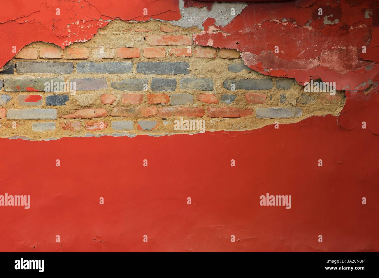 Rusty old wall hole peeling paint background，ancient Stock Photo