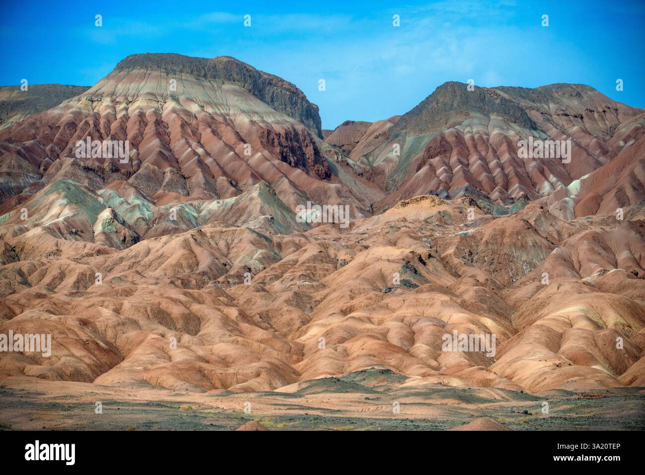 View over the rock formations shaped by erosion in the Zagros Mountains desert between Kashan and Qom in Iran.   The Zagros mountains have been inhabi Stock Photo