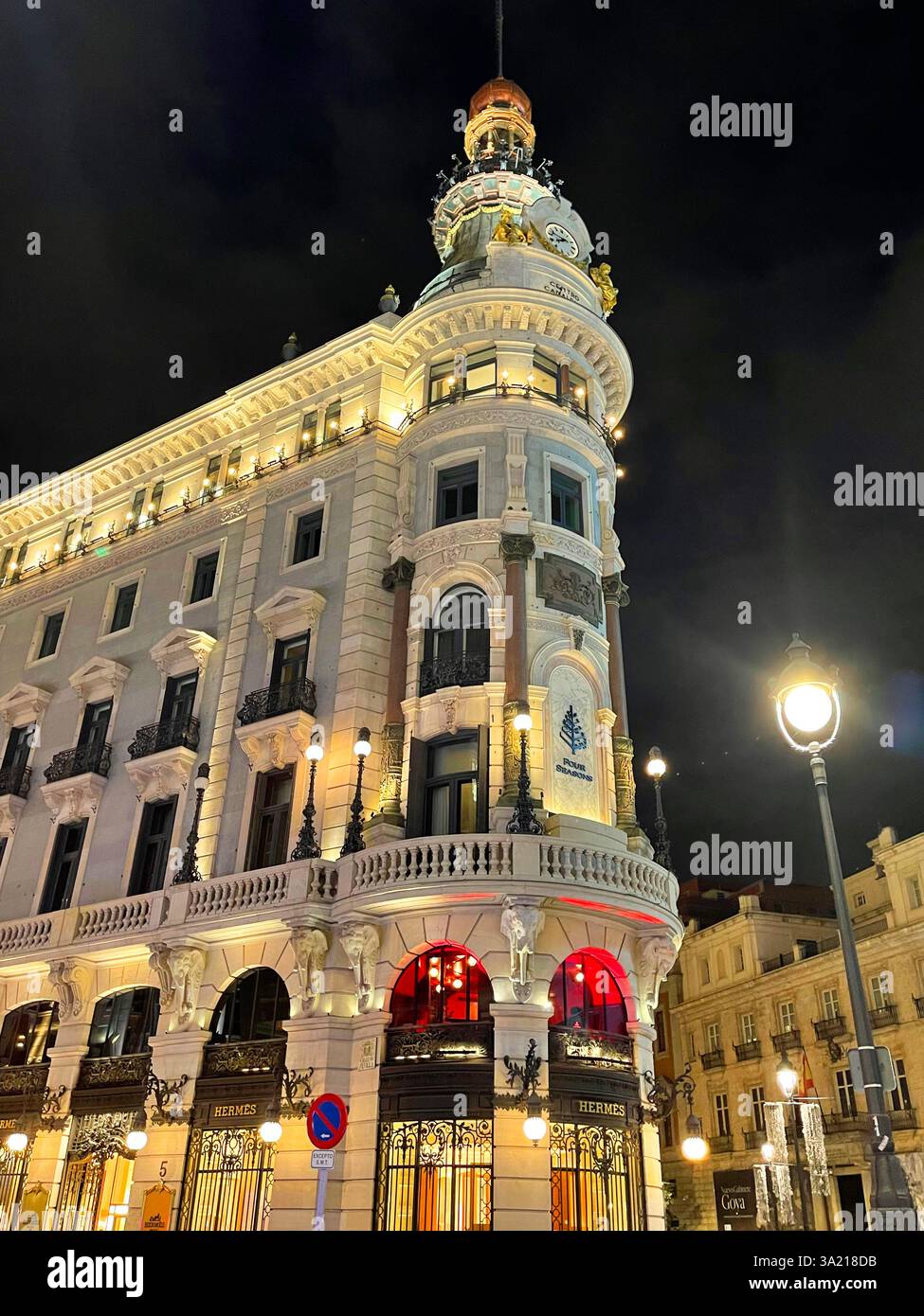 Four seasons hotel, night view. Sevilla street, Madrid, Spain. - Smartphone Captured Stock Image