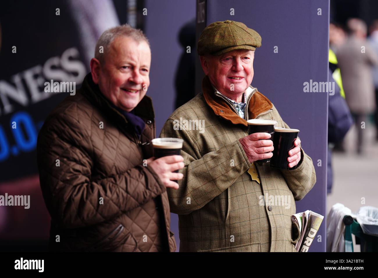 Racegoers with pints of Guinness on day one of the 2025 Cheltenham ...