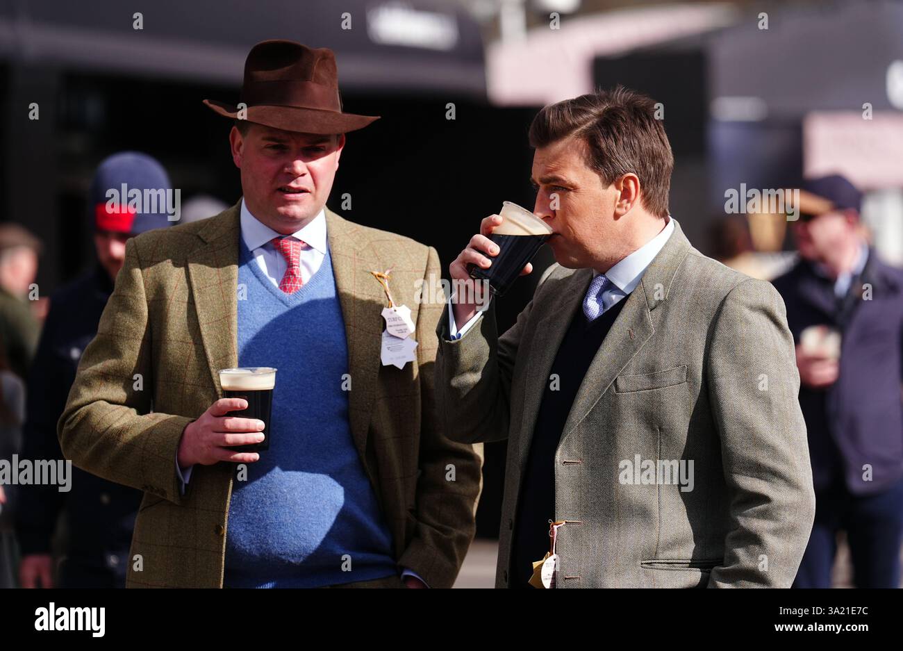 Racegoers with pints of Guinness on day one of the 2025 Cheltenham ...