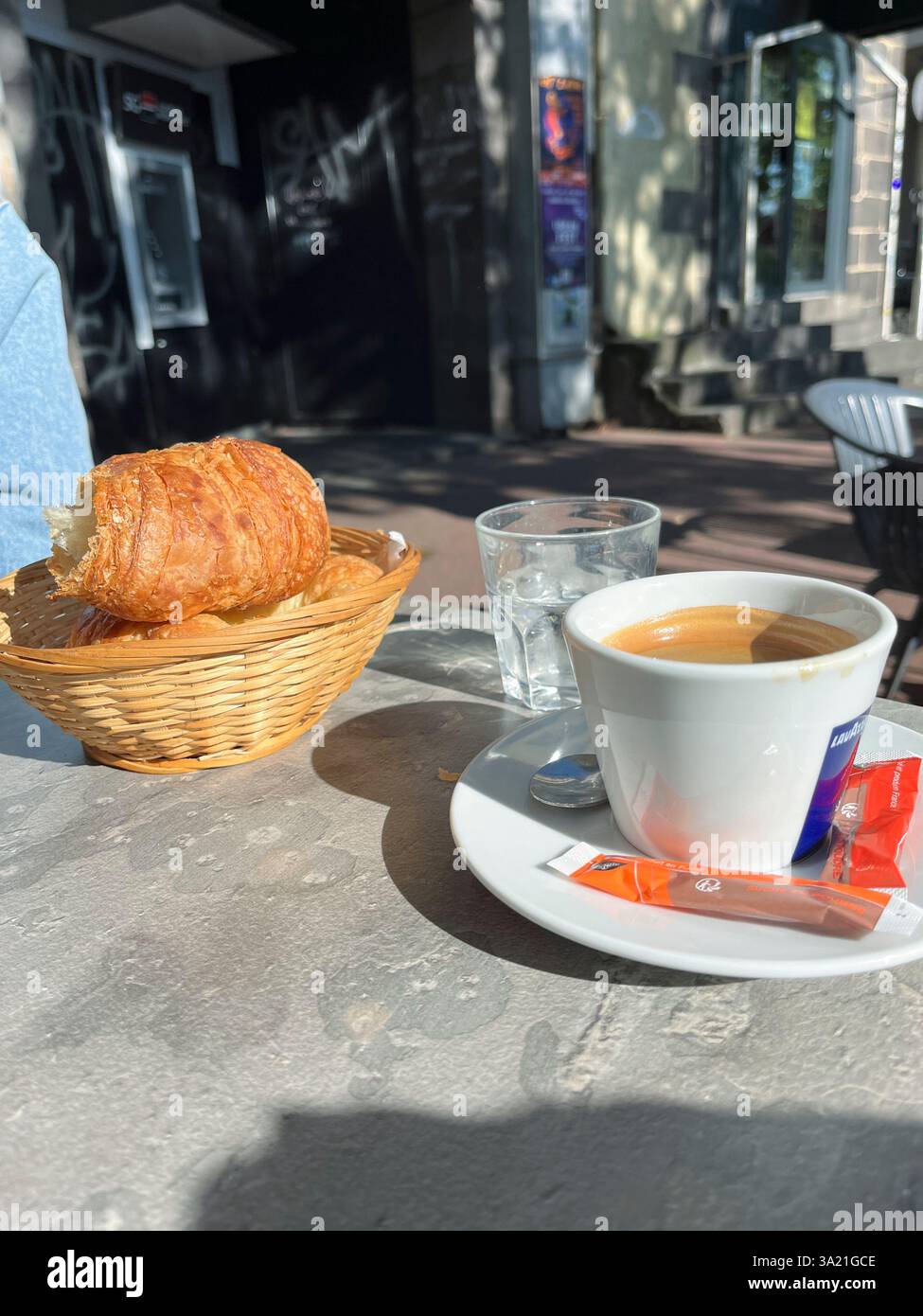 Coffee and Croissant served in cafe, Clermont Ferrand, France, Europe - Smartphone Captured Stock Image