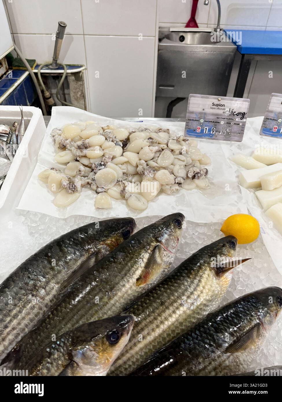 Fish counter in covered market, Meze, Occitanie, France, Europe - Smartphone Captured Stock Image