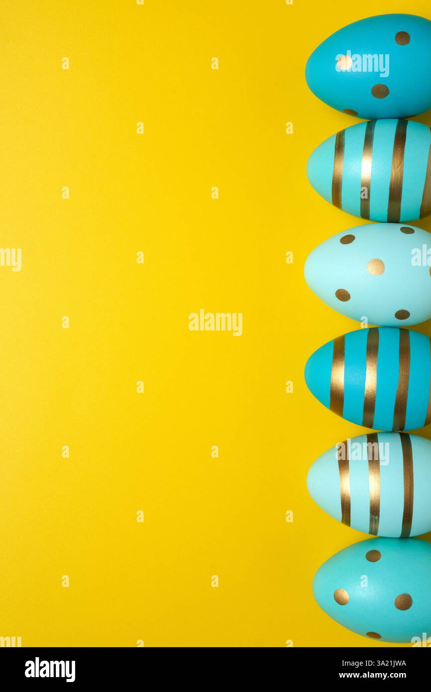 Empty yellow background with Easter eggs Stock Photo