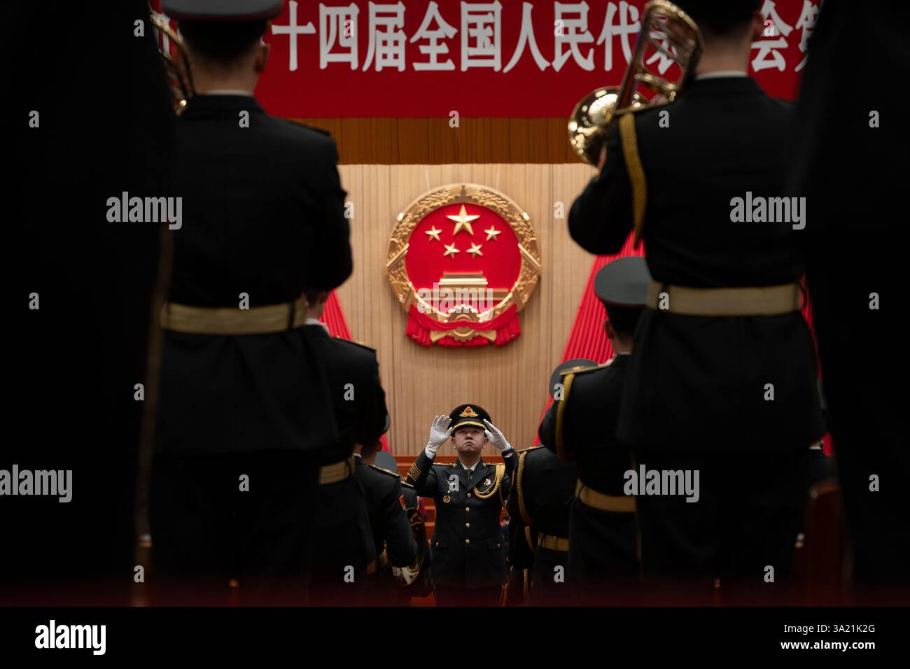 A Chinese military band conductor rehearses before the closing ceremony ...
