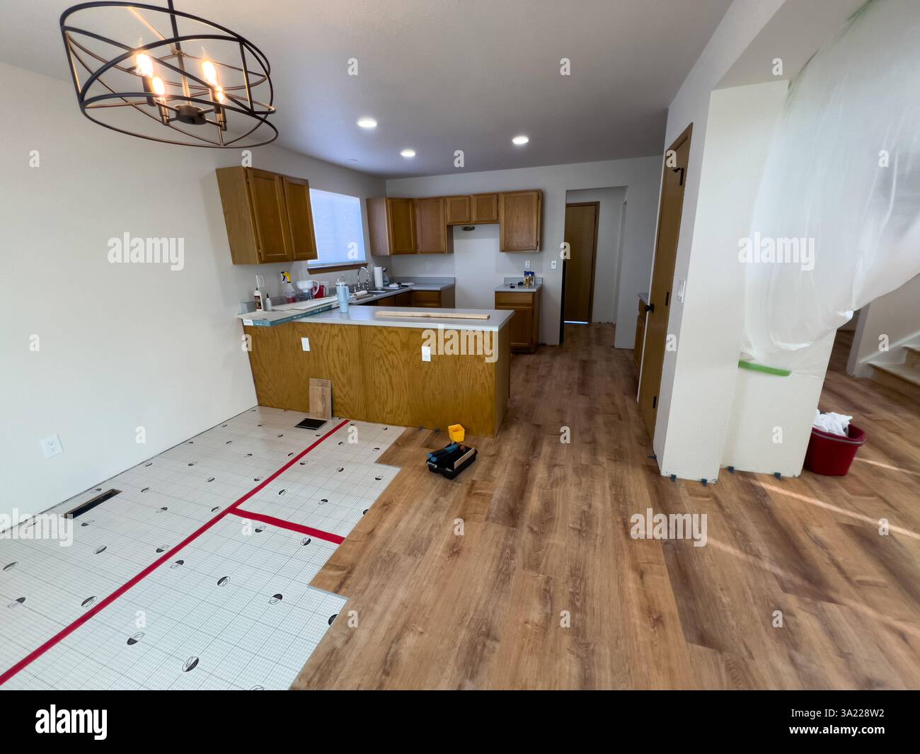 Kitchen Floor Renovation With New Wood Planks Stock Photo - Alamy