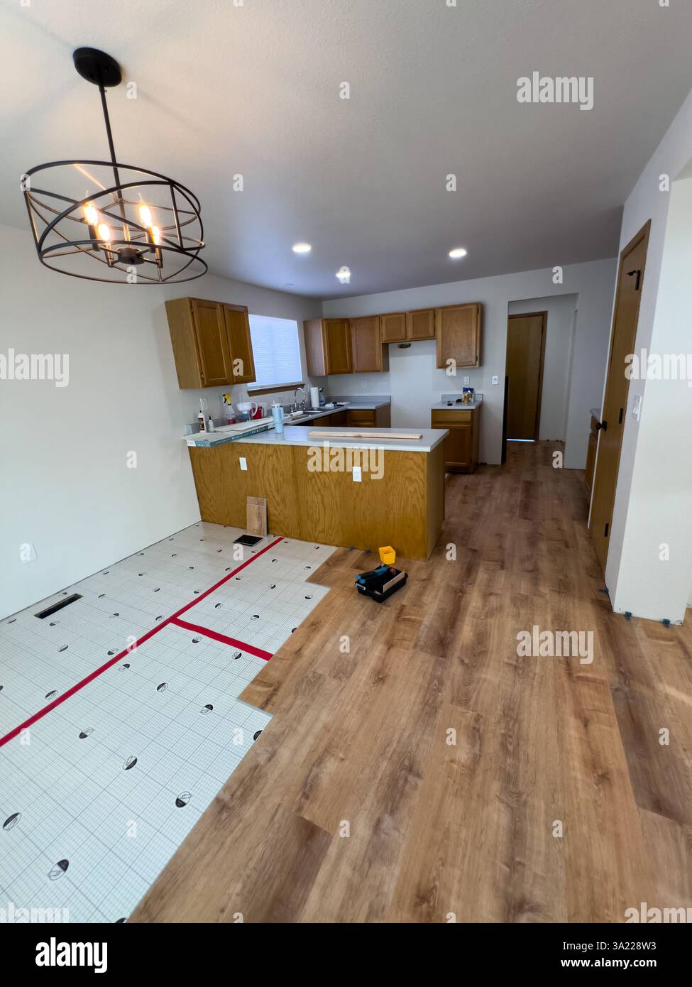 Kitchen Floor Renovation With New Wood Planks Stock Photo - Alamy