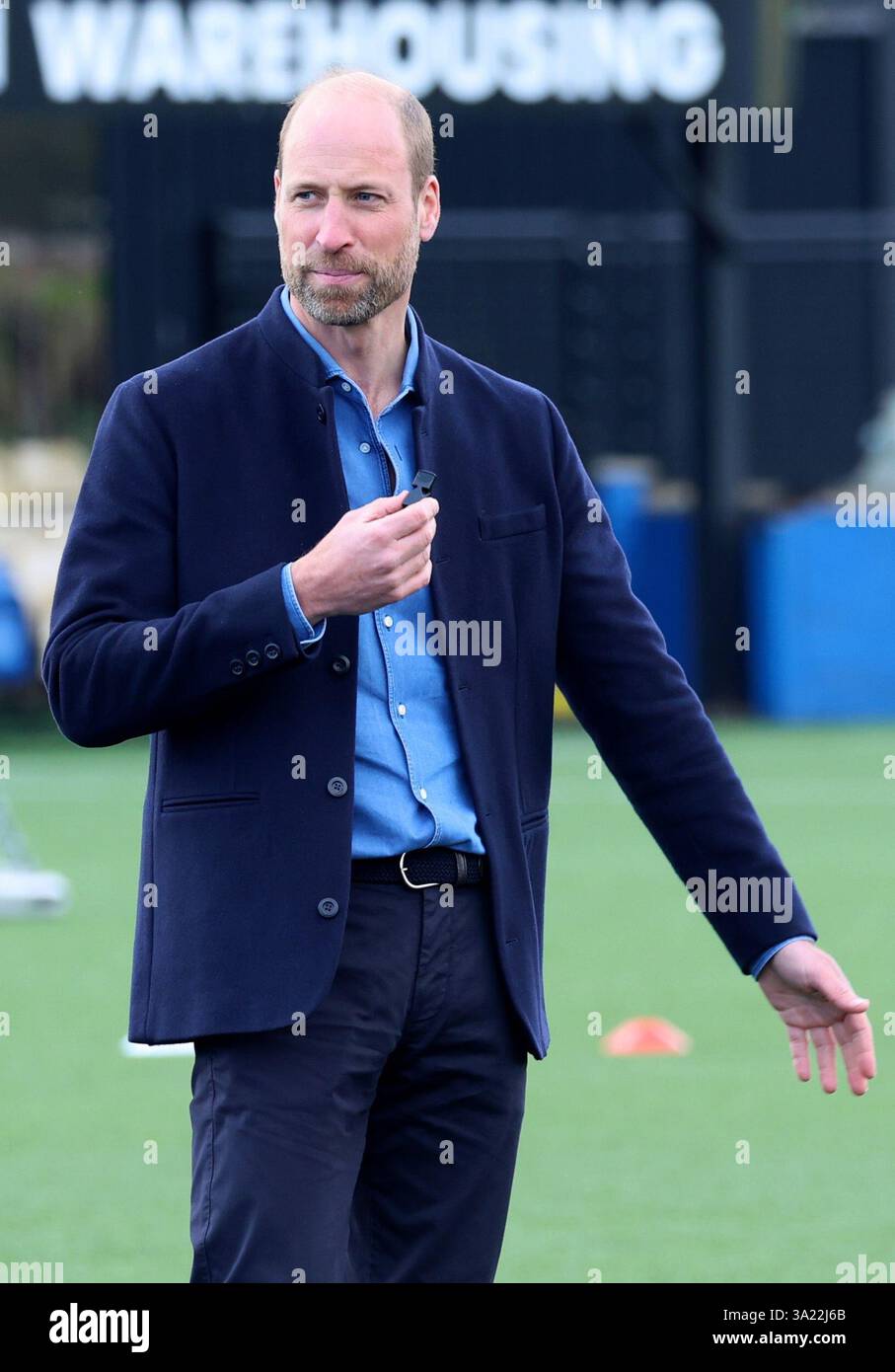The Prince of Wales referees a mini football game during a visit to a ...