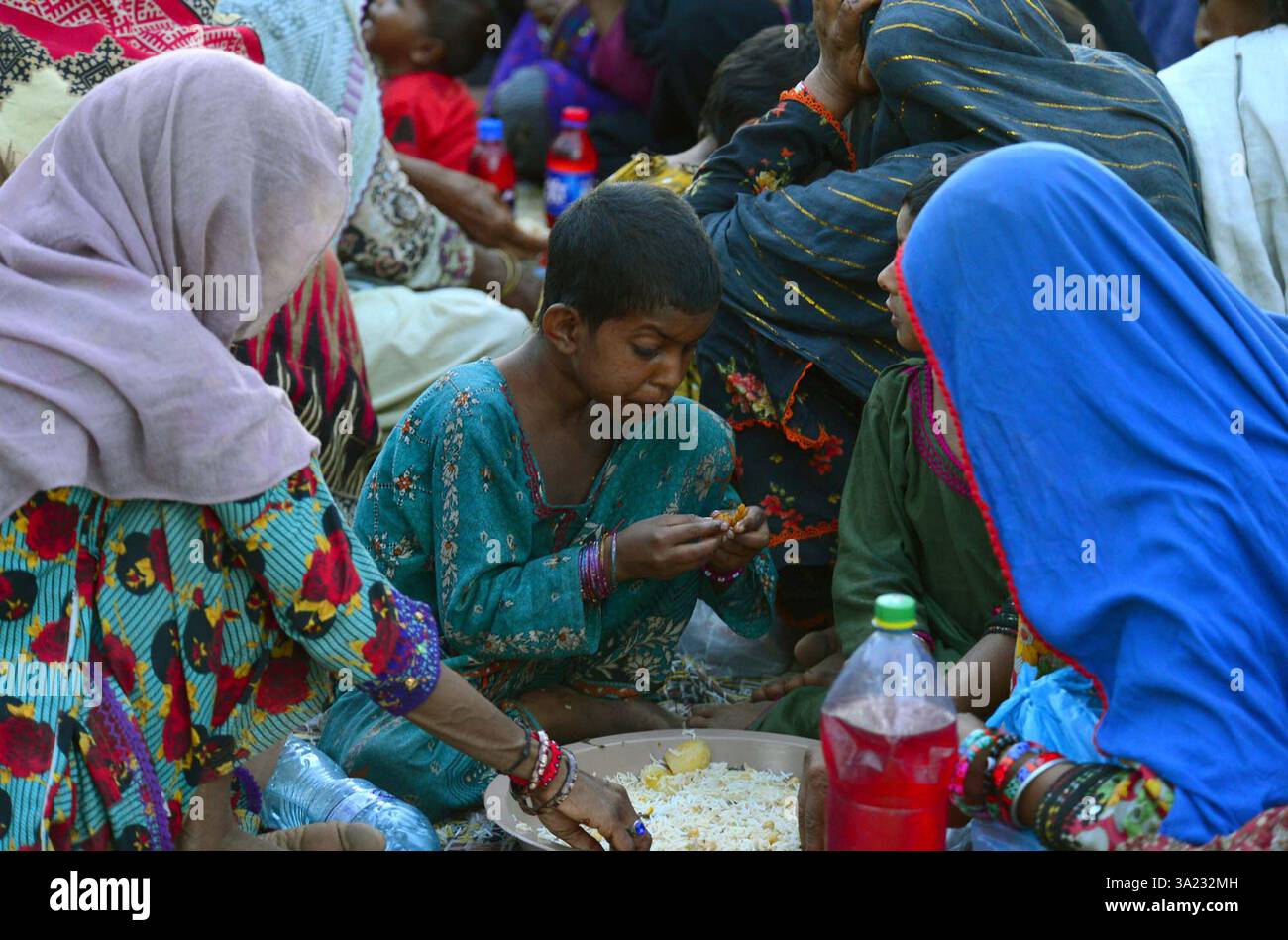 Faithful Muslims are breaking the fast (Iftar) during the Holy Month of ...