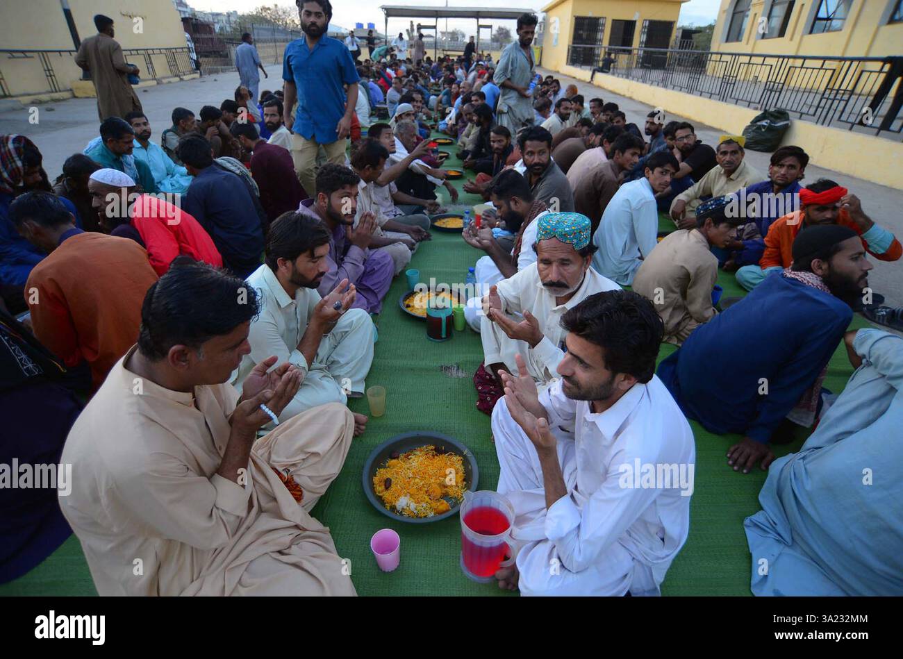 Faithful Muslims are breaking the fast (Iftar) during the Holy Month of ...