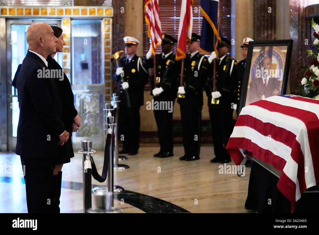 Houston Mayor John Whitmire, left, pay his respects as the remains of U